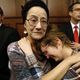 Mary Barrett, of Iowa City, Iowa, and her daughter Rebecca, right, react as Iowa’s six electors cast their Electoral College ballots for Republican Donald Trump, Monday, Dec. 19, 2016, at the Statehouse in Des Moines, Iowa. Photo via AP